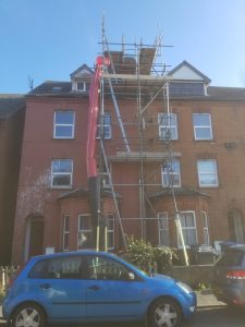 BB Scaffolding Essex - Residential scaffold service with rubbish chute in London.