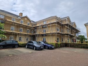 Erected scaffolding around property